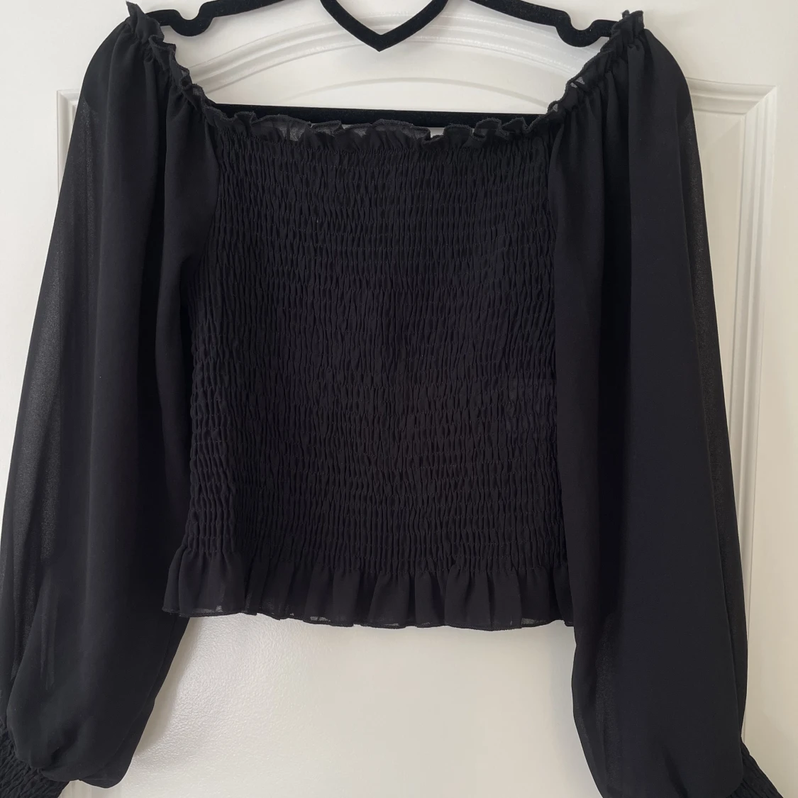 Svart blus från Sisters Point