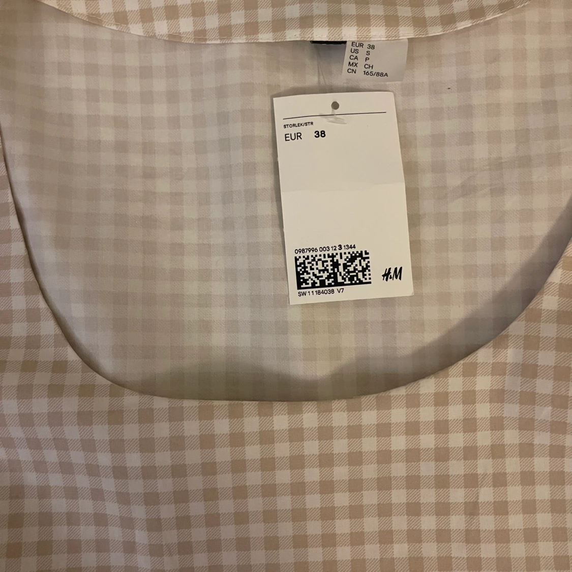 Rutig klänning - 91