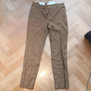 Bruna byxor från hm - Bruna byxor från hm. Ankle length