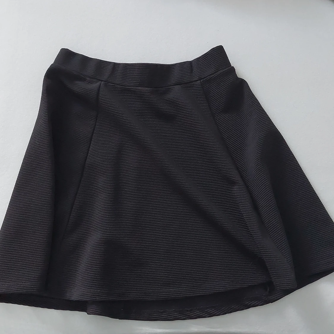 Kort svart kjol - 90