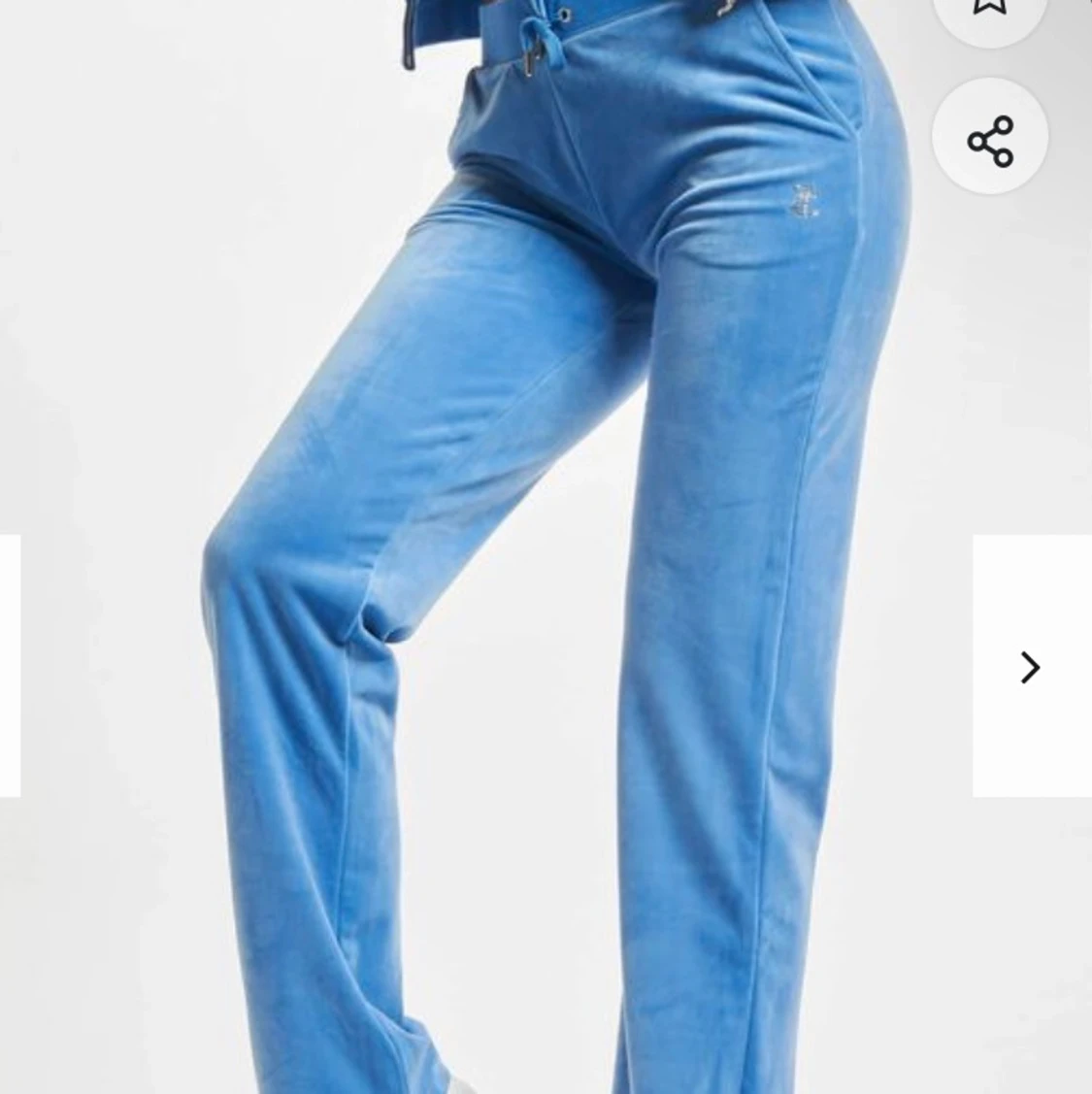 Ljus blåa juicy couture byxor - 90