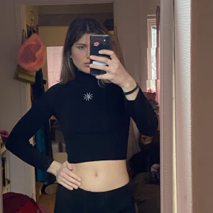 Long sleeved black top  - Worn only a few times, like new 