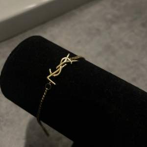 Armband från Yves Saint Laurent (fejk)