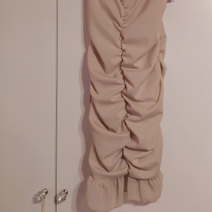 Klänning storlek S-M - Klänning, oanvänd med lapp kvar. Storlek s-m, väldigt stretchigt material. 