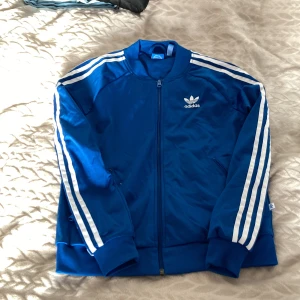 Adidas originals  - Blå sdidas zip tröja 