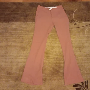 Rose gold wave pants for all events . - The pants is never worn it's still brand new pants.