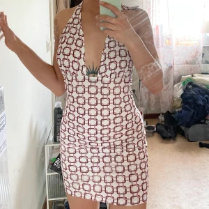 Halterneck klänning - Från Nelly, storlek XS