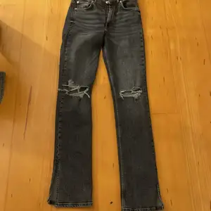 Gråa jeans, storlek 38, frakt tillkommer