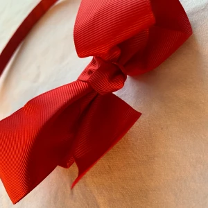 Diadem Hårskena - Supersött diadem med stor röd rosett