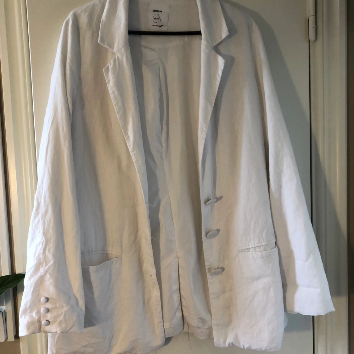 Vit kavaj i linneblandning