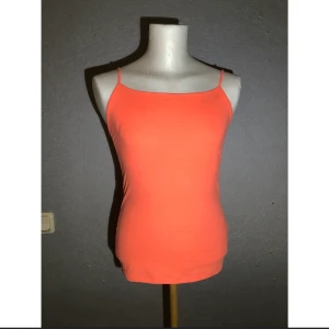 Linne - Ett linne i rosa/orange färg 