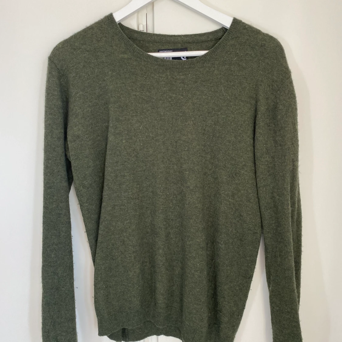 Mörkgrön stickad tröja