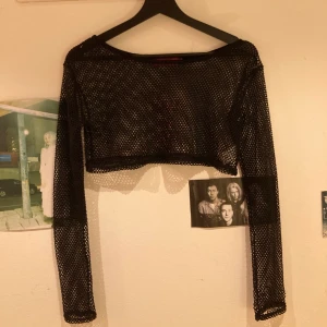 Fishnet-top - köpt på secondhand