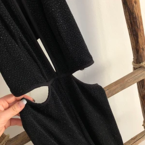 Glittrig jumpsuit  - Helt ny 🙂