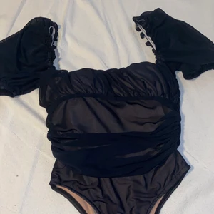 Svart bodysuit - Aldrig använt. Size XS/S