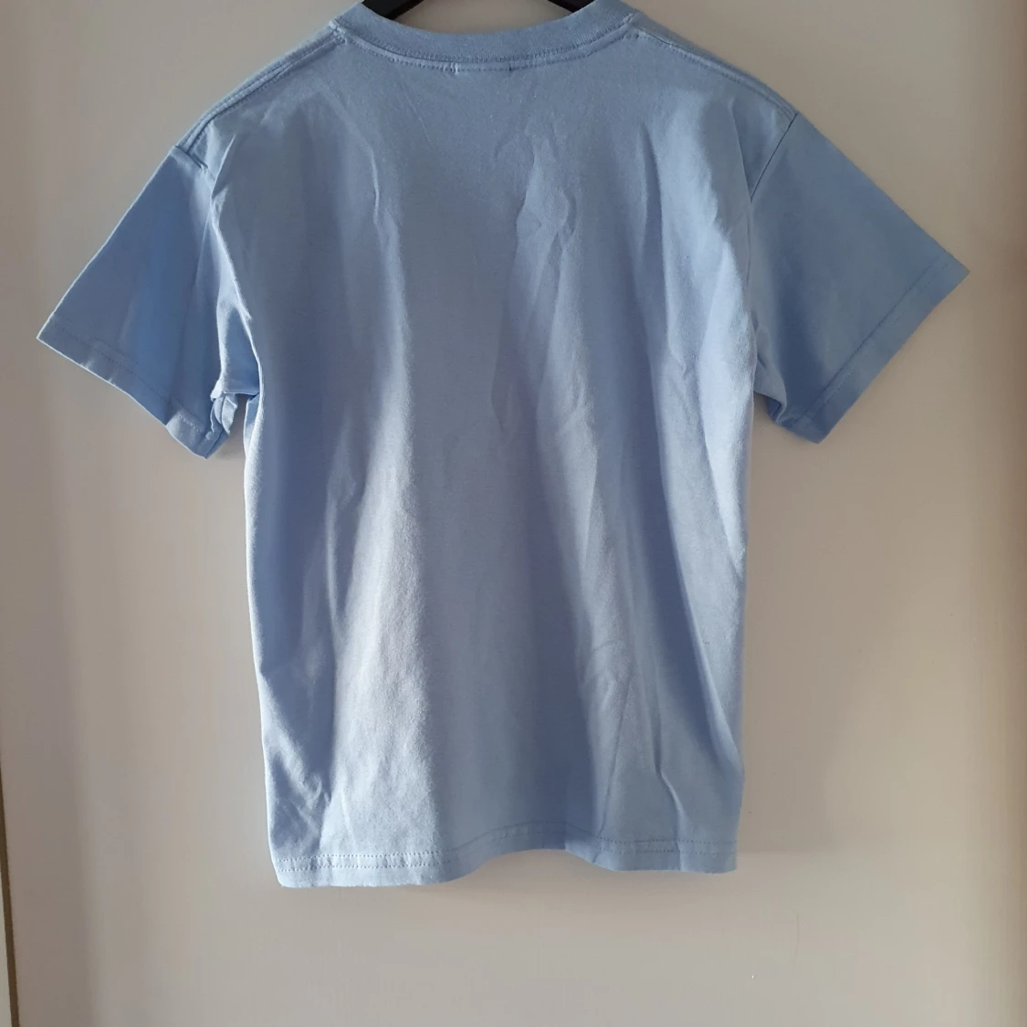 Vintage ljusblå t-shirt med Nasse - 91