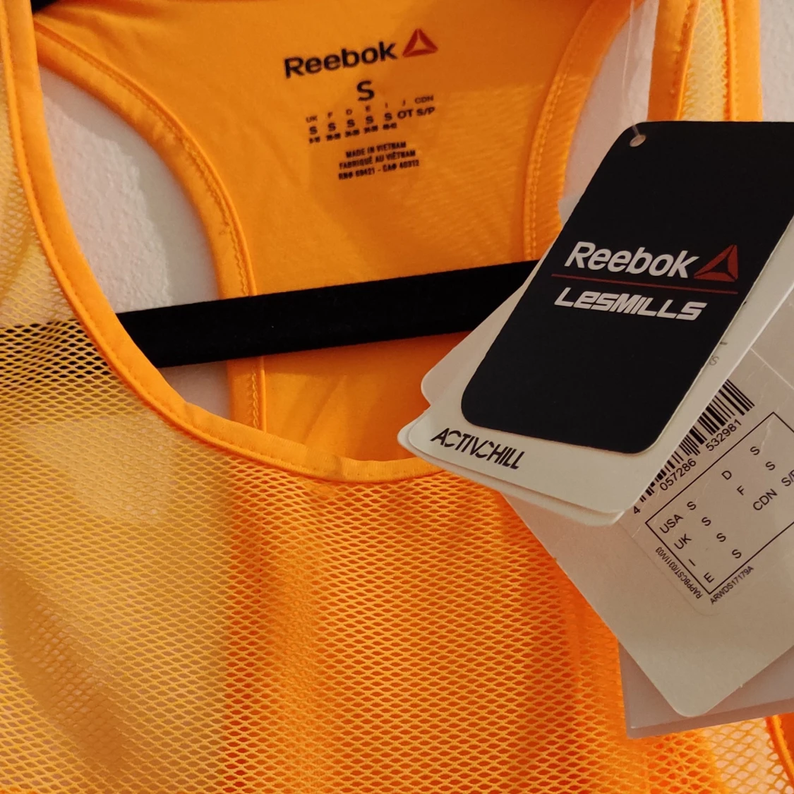 Nytt Reebok linne orange small - 90