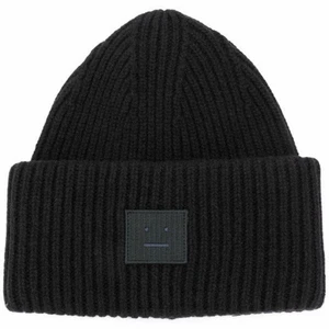 Svart acne mössa  - Svart acne mössa, inköpt i vintras men har inte kommit till användning. Bra skick, onesize storlek. 