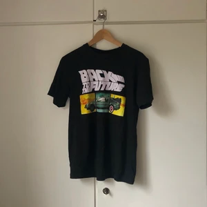 Vintage 90’s “back to the future” T-shirt - Black 90s style t-shirt with “back to the future print”. 
