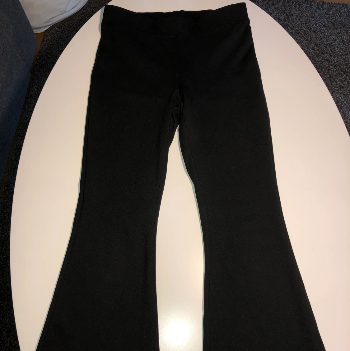 Bootcutbyxor-tights från GinaTricot