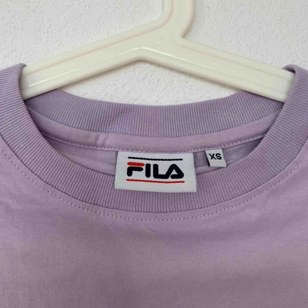 Lavender Fila shirt ! Never worn ✨ meet in Stockholm or pay for shipping 💞. T-shirts.