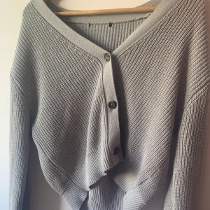 Cardigan - Stickad cardigan i st S