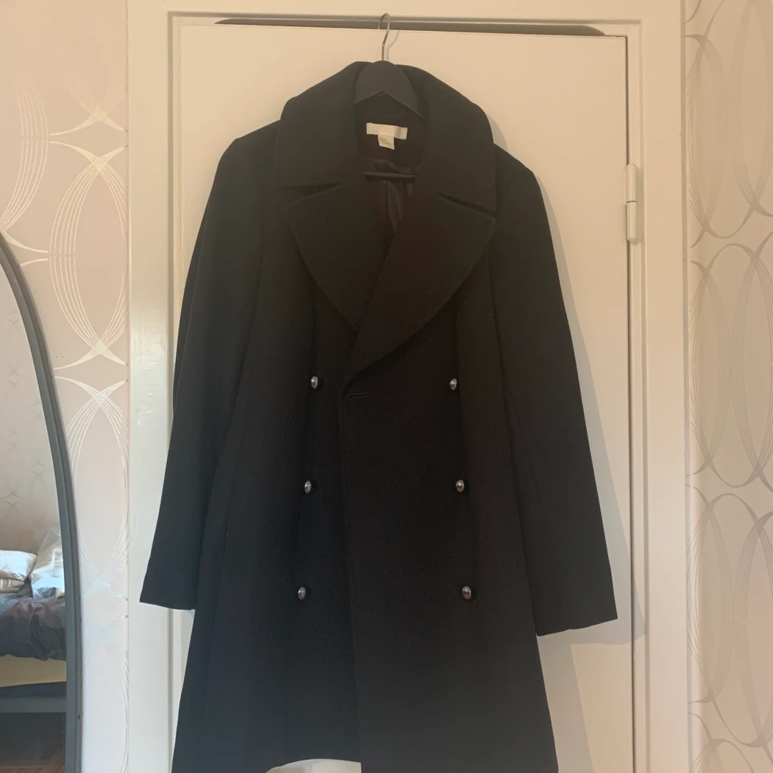 Svart kappa från H&M i storlek 38