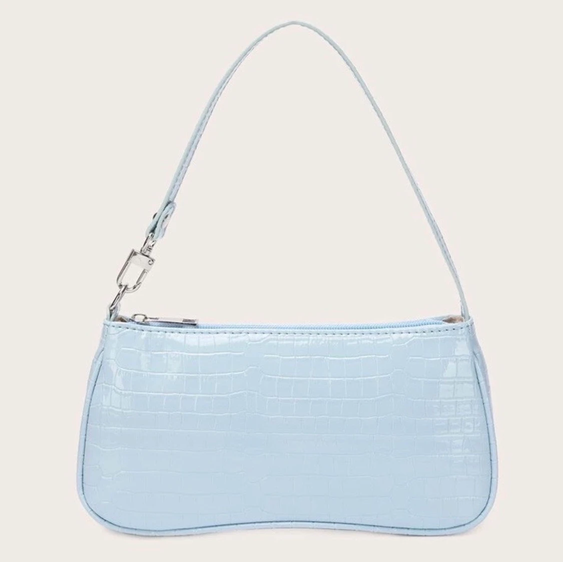 ljusblåa väskor