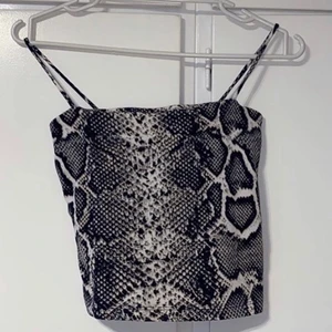 Linne med orm mönster - Storlek XS 