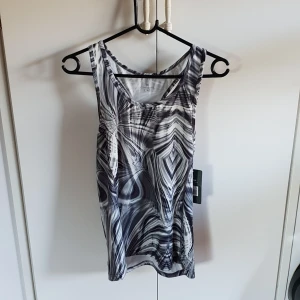  - Träningslinne, aldrig använt 