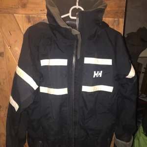  - Helly Hansen regnjacka i väldigt fint skick 
