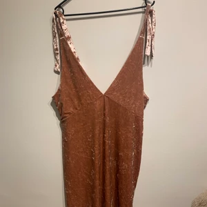 H&M pink velvet slip dress with low cut and adjustable straps  - Bought new, never been worn, perfect condition, soft velvet with adjustable straps and low cut front and back, very stretchy and comfortable. 
