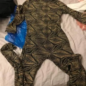 Elegant one piece  - Never used, it’s all covered in glitter. I would recommend it for a taller girl, a size is quite elastic, I would say it’s M/L. But this will adjust to your body :) I don’t mind to send you more pictures. 
