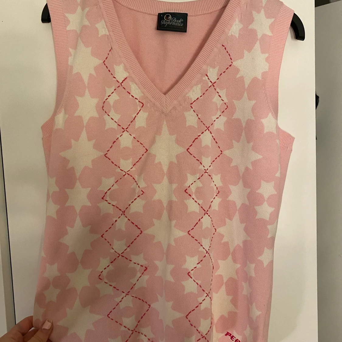 Stickad väst, pullover