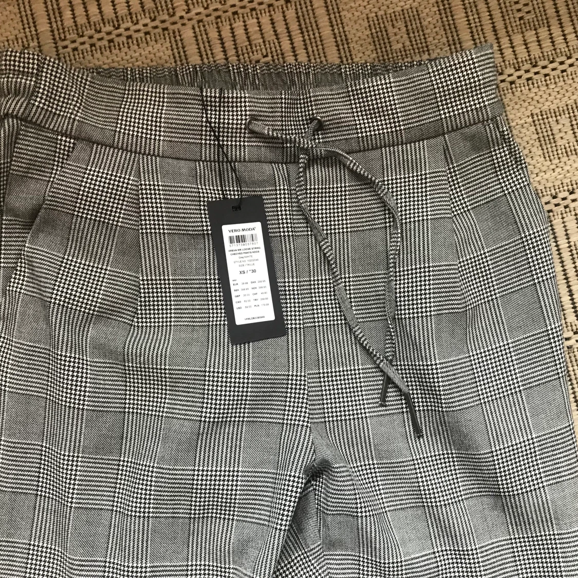 Oanvända byxor - 90