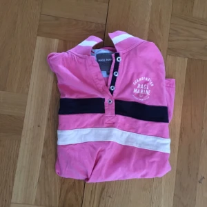  - Rosa Race marine piké storlek 36. Super snygg om man är brun! 