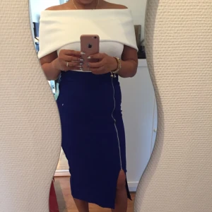  - Top w/ skirt off shoulder design top w/ royal blue long slit and zipper design 