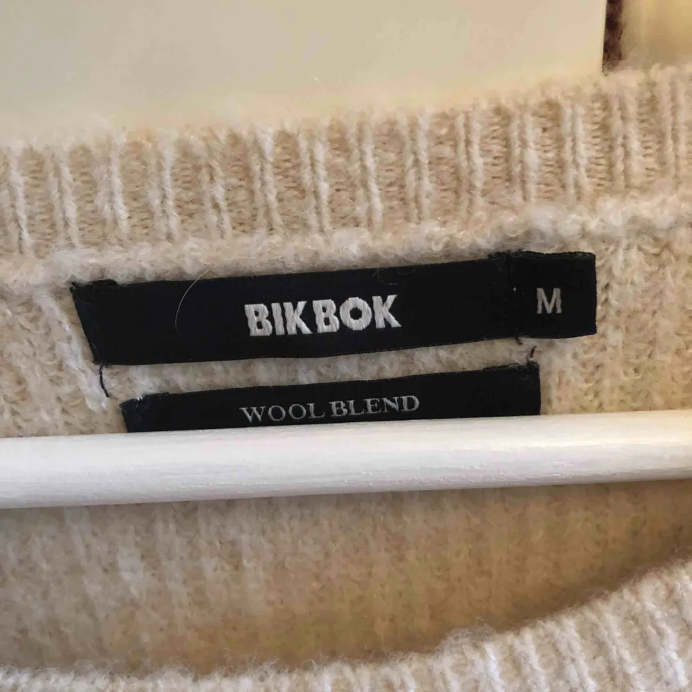 Stickad klänning från BikBok, aldrig använd. Stickat.
