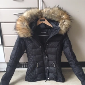  - It's a small hole but it's nothing you can see. Not real fur Like new