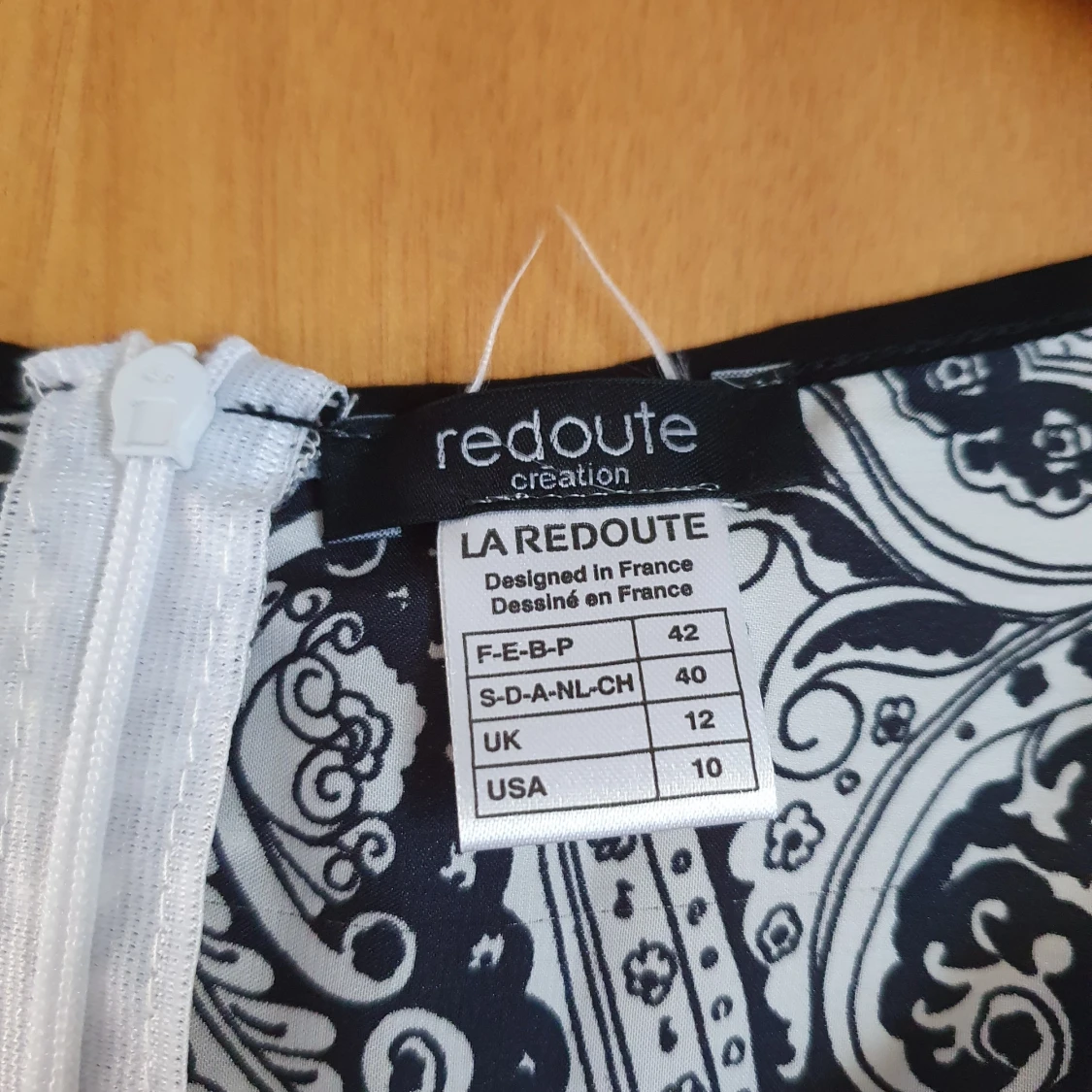 Söt liten blus i 100% polyester i storlek 40 men mer som en 38 - 91