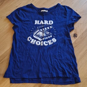 Donuts T-shirt stl L - Är från Barcelona år 2017. Va inte riktigt min stil av tröja så aldrig använd 