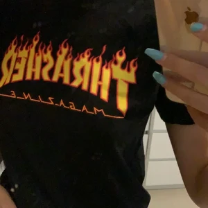 Thrasher - Thrasher tröja i bra kick, skulle nog säga att den passar en S! Köparen står för frakten.