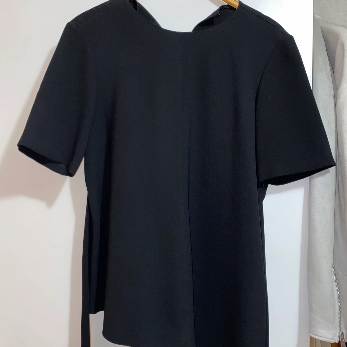 Svart blus med knyte - 90