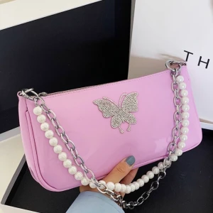 Rosa/lila väska  - Populär väska. Nyskick. Buda från 150kr