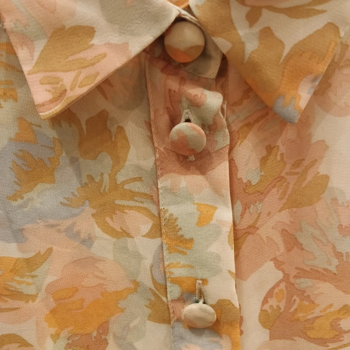 Blommig sheer topp  - 91