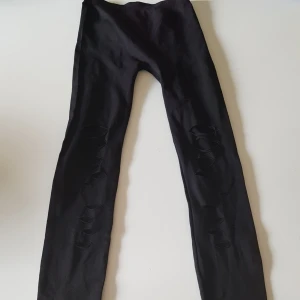  - Tight/byxor med revor +frakt