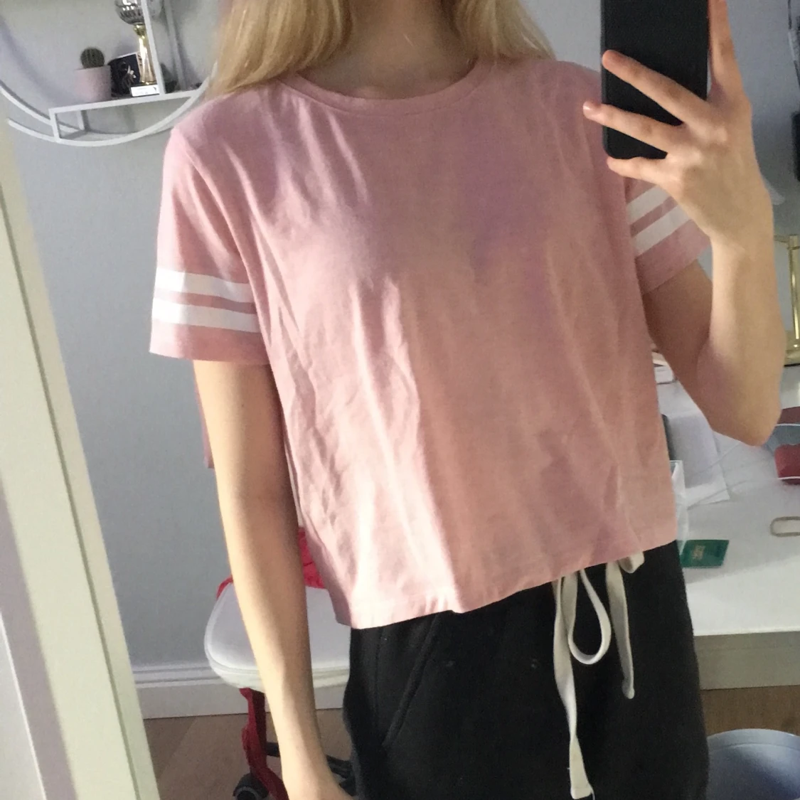 Rosa tröja med streck