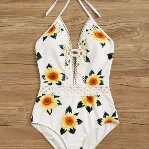 Baddräkt solrosor  - Baddräkt med solrosor från Shein. Endast provad. Storlek XL men var för kort och lite liten på mig som är 175cm och har bh storlek 75D.