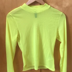 Neongul meshtröja - helt oanvänd meshtröja från h&m, i bra skick!! 