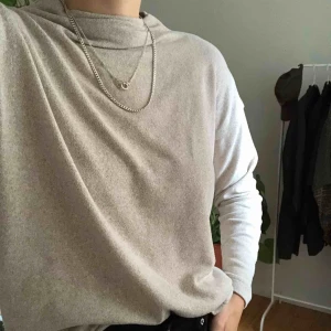  - As new. Super soft and comfortable. Fits loose